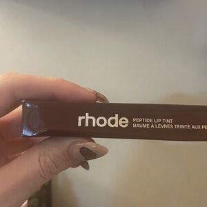 RHODE Peptide Lip Tint in Brown Packaging